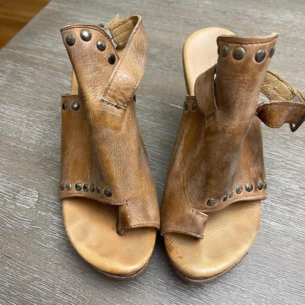 Brown/tan wedge. Size 6.5. Fun high top covering with toe strap